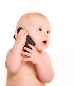 Baby talking on cell phone